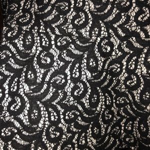 Black & white lace top that trumpets at the bottom